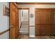 Hallway entrance featuring hardwood floors and closet at 5223 Willow Ridge Dr, Woodstock, GA 30188