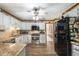 Updated kitchen with granite counters, stainless appliances, and lots of cabinet space at 5223 Willow Ridge Dr, Woodstock, GA 30188