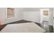 Attic room features windows, dark hardwood floors, and a large rug at 879 Wildwood Ne Rd, Atlanta, GA 30324