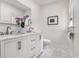 Bathroom features double sink, marble countertop, and modern fixtures at 879 Wildwood Ne Rd, Atlanta, GA 30324
