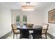 Bright dining room with double doors leading to the outdoor deck at 879 Wildwood Ne Rd, Atlanta, GA 30324