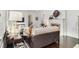 Cozy living room with a fireplace, comfortable seating, and hardwood floors perfect for relaxation and entertaining at 879 Wildwood Ne Rd, Atlanta, GA 30324