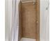 Neutral bathroom features a tiled shower with a shower curtain and chrome fixtures at 121 Gosdin Rd, Palmetto, GA 30268