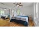 Cozy bedroom with ceiling fan, ample natural light, and closet at 121 Gosdin Rd, Palmetto, GA 30268