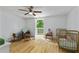 Bedroom featuring hardwood floors, access to a balcony, crib, and other Bedroom items at 121 Gosdin Rd, Palmetto, GA 30268