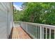 Outdoor deck offers views of mature trees at 121 Gosdin Rd, Palmetto, GA 30268