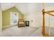 Inviting attic room featuring a cozy chair and natural light at 1821 N Rock Springs Ne Rd, Atlanta, GA 30324