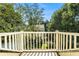 Backyard view from upper deck showcases lush landscaping at 1821 N Rock Springs Ne Rd, Atlanta, GA 30324
