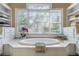 Relaxing bathroom with a large soaking tub and ample storage at 1821 N Rock Springs Ne Rd, Atlanta, GA 30324