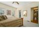 Bedroom featuring neutral walls and carpet with a bed and view through to the bathroom at 1821 N Rock Springs Ne Rd, Atlanta, GA 30324