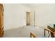 Bedroom featuring light walls, carpet, and a view of the open doorway to the hall at 1821 N Rock Springs Ne Rd, Atlanta, GA 30324