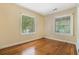 Bright bedroom with hardwood floors and two windows that provide great natural light at 1821 N Rock Springs Ne Rd, Atlanta, GA 30324