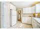Classic kitchen featuring white cabinetry, tile floors, and ample counter space at 1821 N Rock Springs Ne Rd, Atlanta, GA 30324