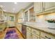 Bright kitchen with granite countertops, stainless steel appliances, and wood floors at 1821 N Rock Springs Ne Rd, Atlanta, GA 30324