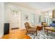 Inviting living room with hardwood floors, natural light, and a stylish geometric rug at 1821 N Rock Springs Ne Rd, Atlanta, GA 30324