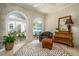 Bright sunroom with brick walls, large windows, and tile flooring at 1821 N Rock Springs Ne Rd, Atlanta, GA 30324