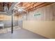 Unfinished basement with ample space and exposed beams at 208 Bruce Ct, Dallas, GA 30157