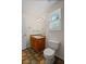 Bathroom featuring vanity with a sink, neutral paint, and a window providing natural light at 208 Bruce Ct, Dallas, GA 30157