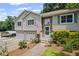 Lovely home boasting a charming stone facade, two-car garage, and beautifully landscaped front yard at 208 Bruce Ct, Dallas, GA 30157
