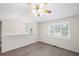 Bright, airy living room showcasing a partial wall and a large window at 208 Bruce Ct, Dallas, GA 30157