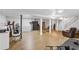 Open basement featuring laminate flooring, providing ample space for various activities at 2136 Briarwood Ct, Snellville, GA 30078