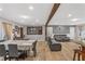 Spacious living and dining area with hardwood floors and comfortable seating arrangement at 2136 Briarwood Ct, Snellville, GA 30078