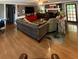Cozy living room featuring hardwood floors, fireplace, and ample space for entertaining at 2194 Meadow Dr, Snellville, GA 30078