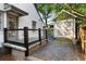 Backyard featuring patio, shed, and mature trees at 103 Willow Wood Se Cir, Atlanta, GA 30317