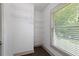 Walk-in closet with shelving and storage, and a large window with natural light at 103 Willow Wood Se Cir, Atlanta, GA 30317