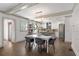 Elegant dining area with modern lighting fixture adjacent to the updated kitchen at 103 Willow Wood Se Cir, Atlanta, GA 30317