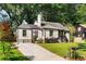 Attractive home featuring a long driveway and a beautifully landscaped front yard at 103 Willow Wood Se Cir, Atlanta, GA 30317