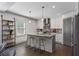 Bright kitchen featuring a center island and stainless steel appliances at 103 Willow Wood Se Cir, Atlanta, GA 30317