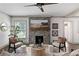 Cozy living room with a stylish fireplace, decorative accents, and comfortable seating at 103 Willow Wood Se Cir, Atlanta, GA 30317