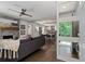 Open-concept living area with fireplace and hardwood floors flowing into the dining area at 103 Willow Wood Se Cir, Atlanta, GA 30317