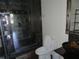 Well-lit bathroom featuring a modern vanity and glass-enclosed shower at 115 W Peachtree Nw Pl # 702, Atlanta, GA 30313