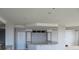 Bright, open kitchen featuring a breakfast bar, neutral colors, and recessed lighting at 115 W Peachtree Nw Pl # 702, Atlanta, GA 30313
