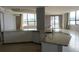Modern kitchen with granite counters, white cabinets, and stainless steel appliances at 115 W Peachtree Nw Pl # 702, Atlanta, GA 30313