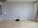 Spacious living room with tile flooring, recessed lighting, and neutral paint at 115 W Peachtree Nw Pl # 702, Atlanta, GA 30313