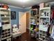 Spacious closet with built-in shelves and storage for shoes, handbags, and accessories at 2510 Lakeshore Ne Dr, Conyers, GA 30012