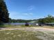 View of a lake at 2510 Lakeshore Ne Dr, Conyers, GA 30012