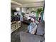 Cozy living room with comfortable seating, stylish decor, large plants and natural light at 2510 Lakeshore Ne Dr, Conyers, GA 30012