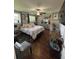 Spacious main bedroom featuring plenty of natural light and hardwood floors at 2510 Lakeshore Ne Dr, Conyers, GA 30012