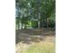Scenic recreation area featuring lakeside seating and recreational swings at 2510 Lakeshore Ne Dr, Conyers, GA 30012