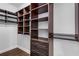 Walk-in closet boasts custom shelving and storage drawers at 2544 Thompson Ne Rd, Brookhaven, GA 30319