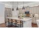 Modern kitchen with a large island, stainless steel appliances, and ample cabinet space at 2544 Thompson Ne Rd, Brookhaven, GA 30319
