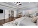Spacious main bedroom features sitting area, large windows, and access to upper level at 2544 Thompson Ne Rd, Brookhaven, GA 30319
