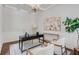 Elegant home office with coffered ceiling, decorative lighting, and natural light at 2544 Thompson Ne Rd, Brookhaven, GA 30319