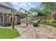 Spacious patio with built-in kitchen and stone accents, ideal for outdoor living and dining at 2544 Thompson Ne Rd, Brookhaven, GA 30319