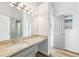 Bathroom with granite countertops, stylish lighting, and a glass-enclosed shower at 7033 Brecken Trce, Lithonia, GA 30058