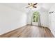 Spacious, bright bedroom featuring hard wood floors, and ample closet space at 7033 Brecken Trce, Lithonia, GA 30058